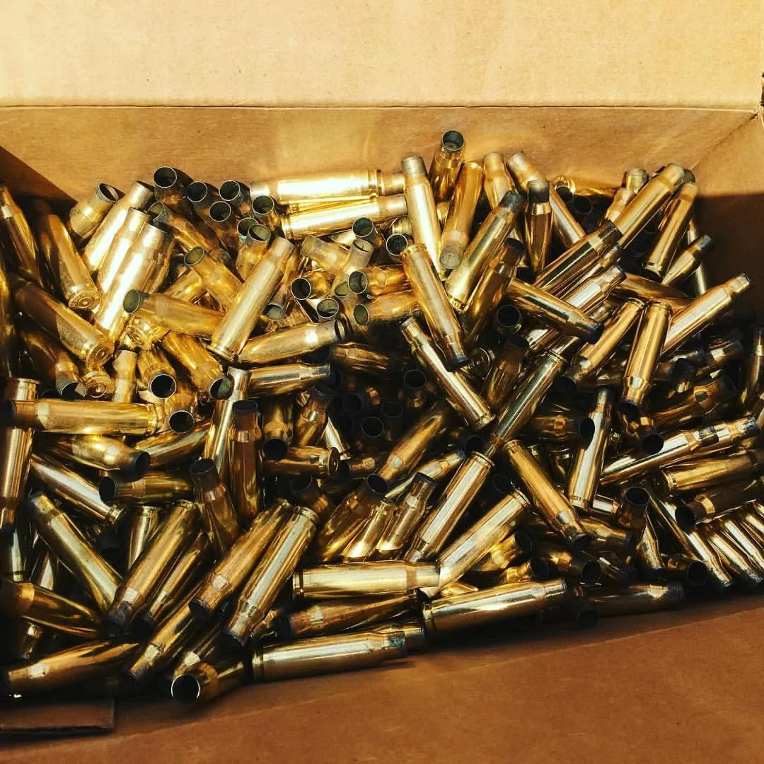 Box of spent rifle brass