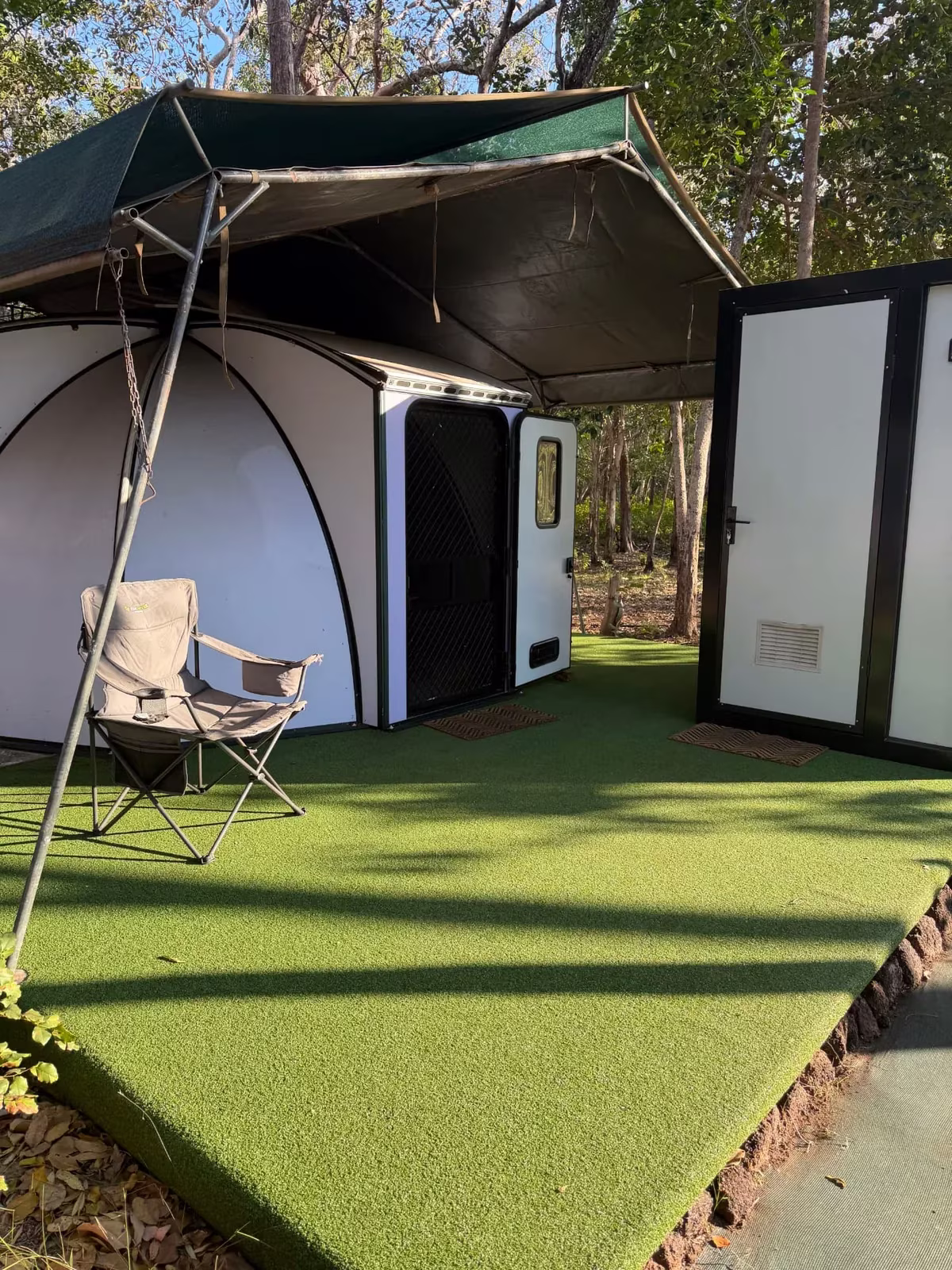 Pod with shade awning, turf deck and ensuite alongside